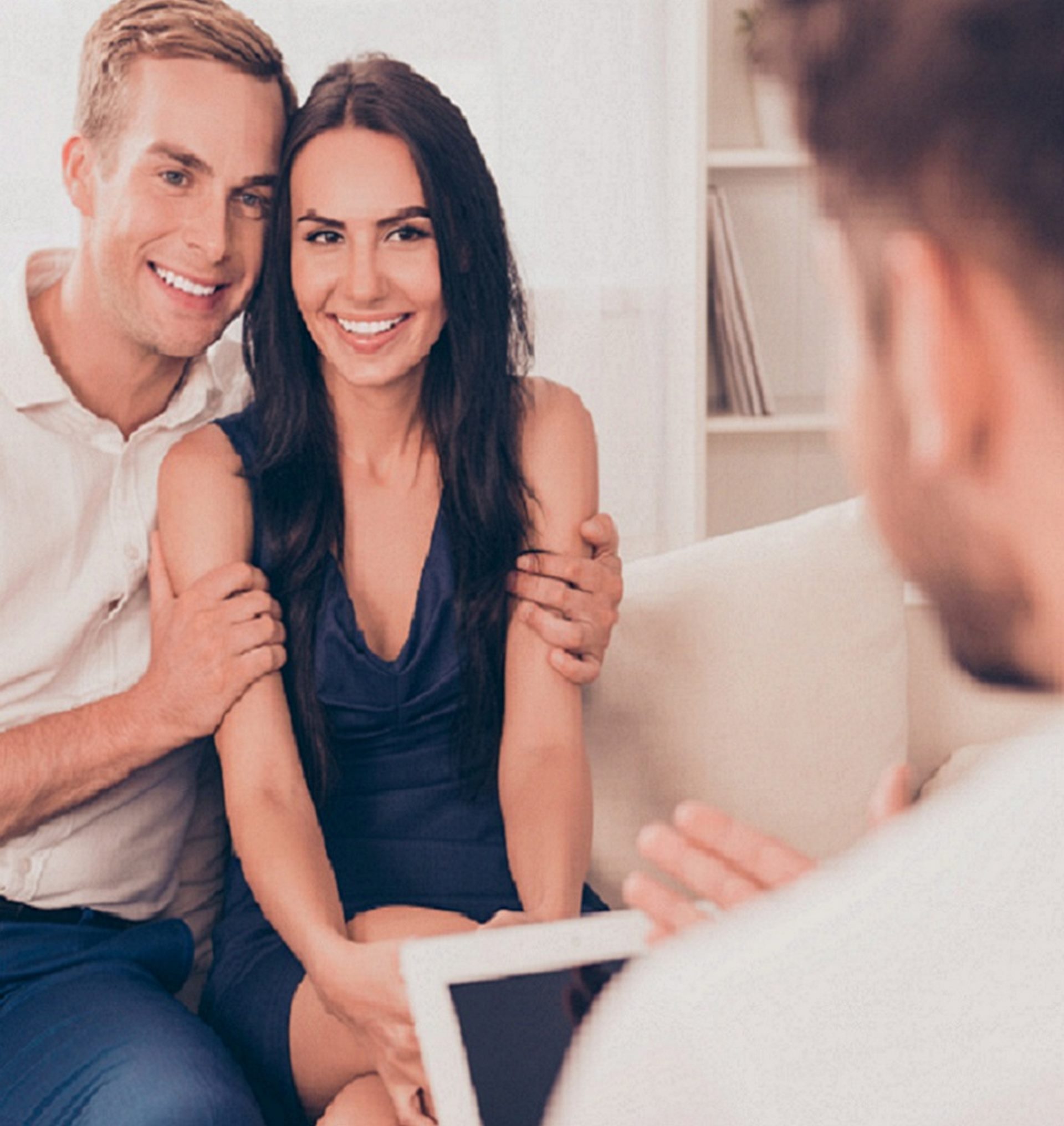 Young happy couple on reception for family psychologist